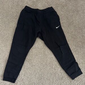 Nike Black Sweatpants with Elastic Cuffs and Tapered Fit